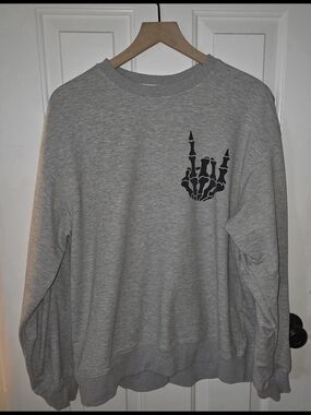Gray Sweatshirt with Black Skeleton Hand Graphic